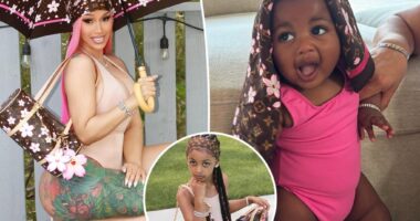 Cardi B and kids pose with over $15K worth of Louis Vuitton