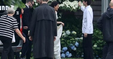 Huma Abedin was seen smiling as she prepared to marry billionaire philanthropist George Soros' son, Alex on Saturday