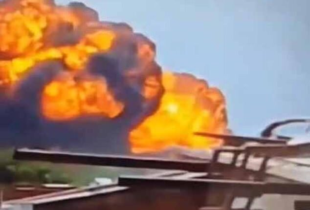 The plane momentarily disappeared from view behind trees and buildings before a massive fireball erupted on the horizon in this horrifying clip