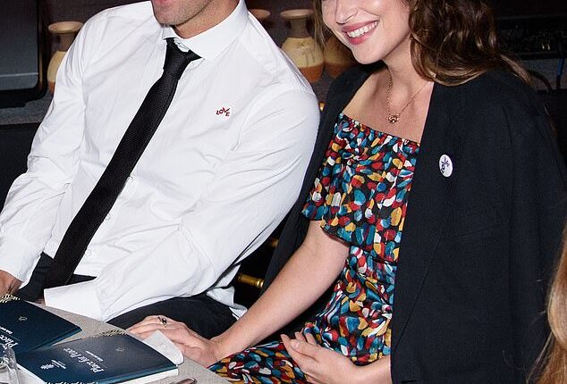 Dakota Johnson and Chris Martin have split after a near-eight year romance (Pictured in 2019)