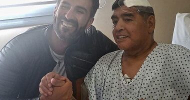 Diego Maradona allegedly died surrounded by the smell of 'urine and faeces', a lawyer representing his daughters has claimed (pictured: Maradona with his doctor Leopoldo Luque)