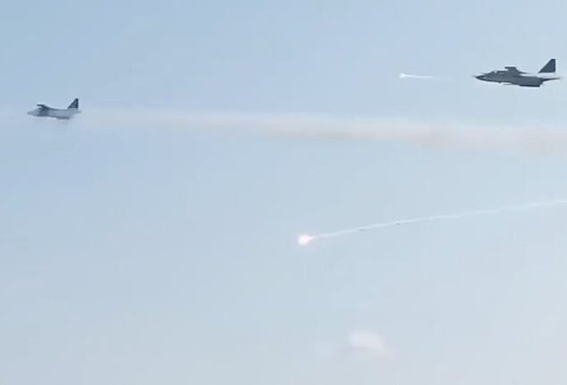 The footage shows heat trap flares and possible missiles from the Su-25s