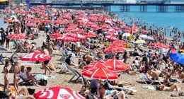 ENGLAND: Brighton beach on Monday as tourists made the most of sweltering temperatures