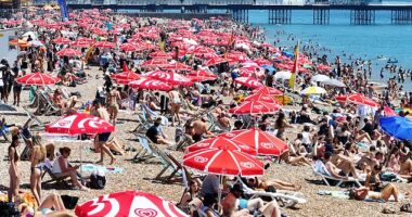 ENGLAND: Brighton beach on Monday as tourists made the most of sweltering temperatures