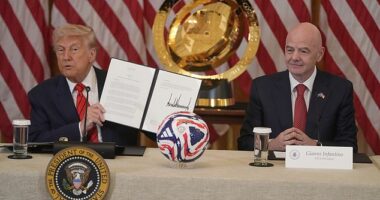 Donald Trump pictured (left) with FIFA president Gianni Infantino (right) last month ahead of this summer's Club World Cup tournament in the USA
