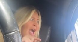 The motorist, who was 'literally shaking', spoke angrily to camera asking whether she was 'in the wrong'