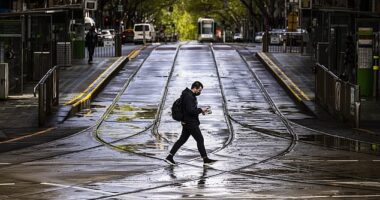 Officers cordoned off Collins Street in Melbourne's CBD from the public about 4.15am on Saturday after a body was found outside an EzyMart (stock image)