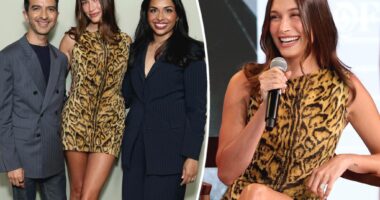 Hailey Bieber walks on the wild side in faux fur leopard-print Versace