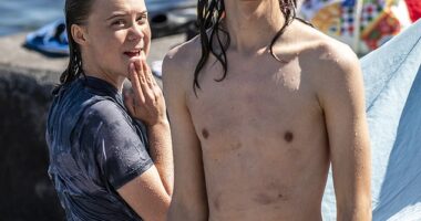 Climate activist-turned Gaza protestor Greta Thunberg has struck up a close friendship with the long-haired photographer Chris Kebbon. Pictured together swimming on May 31 in the sea in Catania, Sicily, shortly before she set sail on her 'Freedom Flotilla' mission to Gaza