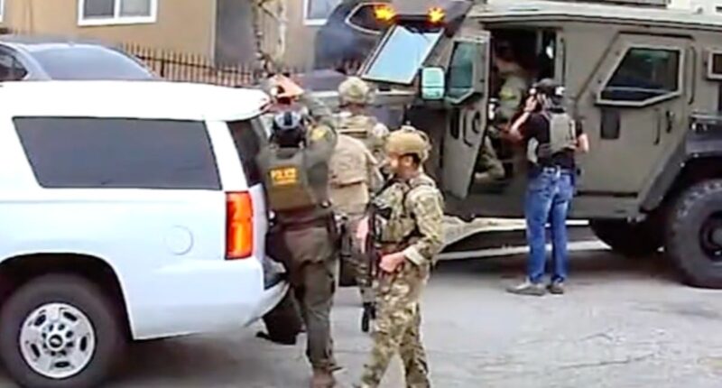 Heavily armed federal agents blow door off suspect’s home. He wasn’t there — but girlfriend and kids were