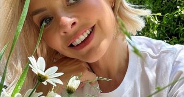 Holly Willoughby shared a sweet snap of her dad Brian sitting in the I'm A Celebrity jungle as she led the stars celebrating Father's Day on Sunday