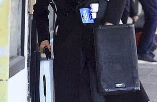 Sarah Roberts, 40, packed on the PDA with her new beau Jake Iesu on Friday as the happy couple attended an art show in Sydney