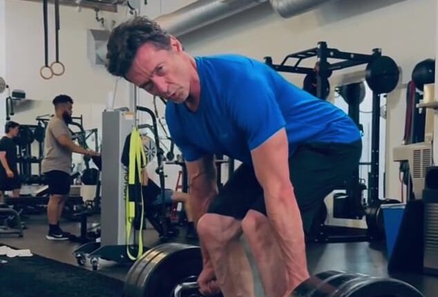 Fans have gone wild over a video showing Hollywood superstar Hugh Jackman doing some 'heavy lifting' in a particularly tough gym workout. Pictured: A scene from the clip which was shared to Hugh's Instagram
