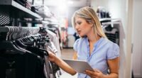 An American woman working in retail in Queensland has sparked a fierce online debate after a customer abruptly shut her down for using the word 'darling' during a routine greeting
