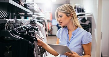 An American woman working in retail in Queensland has sparked a fierce online debate after a customer abruptly shut her down for using the word 'darling' during a routine greeting