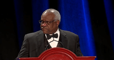 Clarence Thomas giving a keynote address.