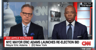 Jake Tapper interviewing Eric Adams.
