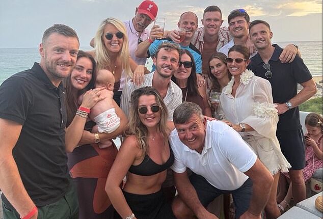 Jamie Vardy (left) and his wife Rebekah (3rd right) enjoyed some drinks with Harry Maguire (2nd right), James Maddison (centre) and their families in Portugal