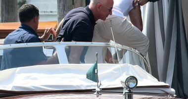 Amazon's founder Jeff Bezos (C) arrives at the Aman Hotel in Venice