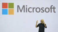 Microsoft is planning to cut thousands of jobs as it ramps up investments in artificial intelligence (Pictured: CEO Satya Nadella)
