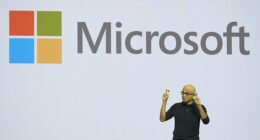 Microsoft is planning to cut thousands of jobs as it ramps up investments in artificial intelligence (Pictured: CEO Satya Nadella)