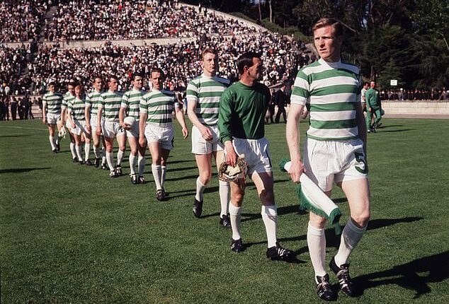 John Clark (centre) strides out with his team-mates before they made history in 1967