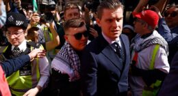 Kneecap wear ‘Free Mo Chara’ t-shirts as band member in court on terrorism charge over Hezbollah flag