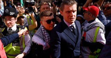 Kneecap wear ‘Free Mo Chara’ t-shirts as band member in court on terrorism charge over Hezbollah flag