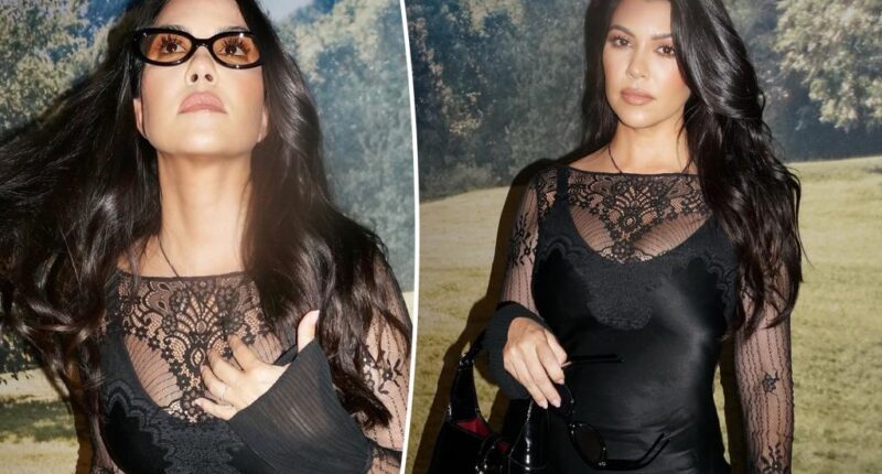 Kourtney Kardashians rocks sheer lace mini dress