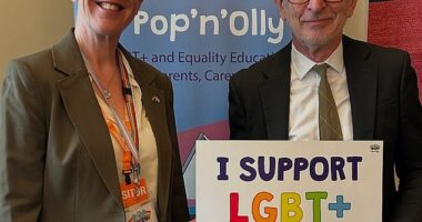 Labour MPs have shown support for an activist group which promotes 'transgender Cinderella' books to primary schools (pictured left to right: Mel Lane, head of education at Pop¿n¿Olly, with Paul Davies MP)