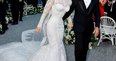 Lauren Sanchez stunned in a lacy turtleneck white Dolce & Gabbana gown as she married Amazon founder Jeff Bezos in Venice, Italy