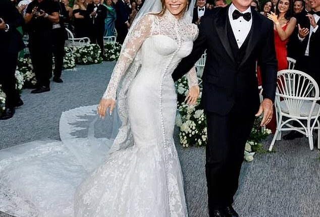 Lauren Sanchez stunned in a lacy turtleneck white Dolce & Gabbana gown as she married Amazon founder Jeff Bezos in Venice, Italy