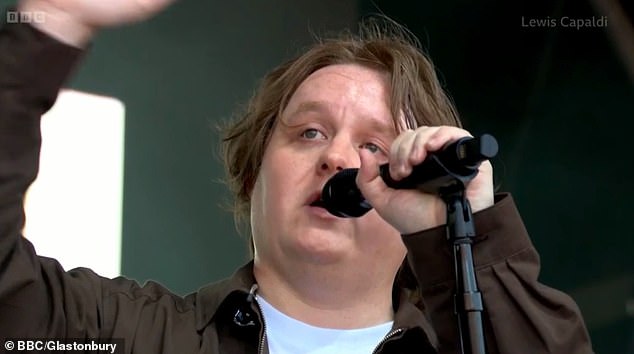 Lewis Capaldi, 28, choked back tears as he declaring 'I'm back baby' during his emotional return to Glastonbury's iconic Pyramid Stage for a secret set on Friday