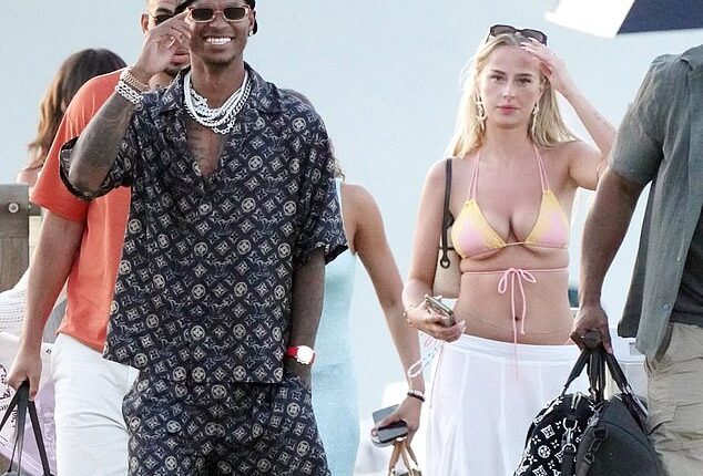 Marcus Rashford was spotted enjoying some summer sun alongside a mystery companion