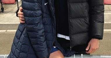 Matildas star Charli Grant has revealed the struggles behind maintaining a long distance relationship (pictured, with her fiancé Lachlan Cameron)