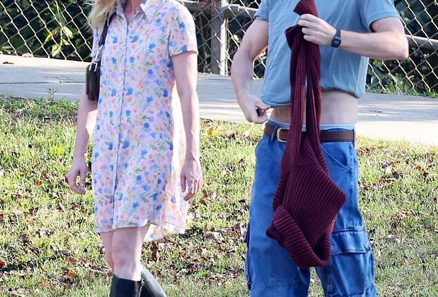 Channing Tatum plays infamous robber Jeffrey Manchester in his forthcoming movie 'Roofman.' (Pictured on set in Charlotte, North Carolina with Kirsten Dunst who plays his unwitting girlfriend Leigh Wainscott)