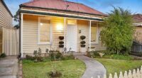 BEFORE: This unassuming weatherboard cottage, once dubbed 'the worst house on the best street', has just sold for $3.6million after an extraordinary architectural makeover
