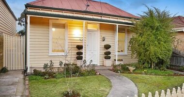 BEFORE: This unassuming weatherboard cottage, once dubbed 'the worst house on the best street', has just sold for $3.6million after an extraordinary architectural makeover