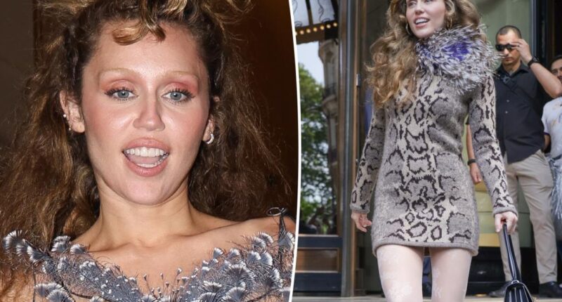 Miley Cyrus nearly puts it all on display in Paris in feathers and leather