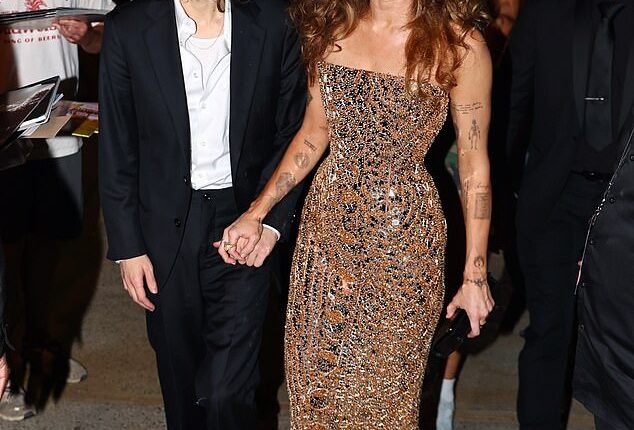 Miley Cyrus was the epitome of glamour on Friday night as she and boyfriend Maxx Morando stepped out following the premiere of her visual album at Hotel Beacon in New York City