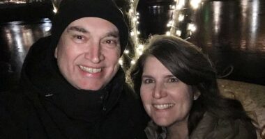 Jenny Boelter, the wife of Minnesota shooting suspect Vance Boelter (pictured together), was pulled over around 10am on Saturday with a weapon, ammunition, cash and passports inside the vehicle