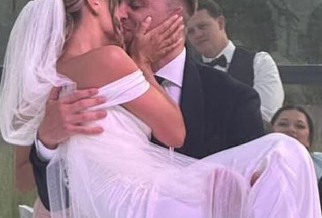 In a new photo shared on her Story, Dani Dyer, 28, was swept off her feet by her new husband, Jarrod Bowen, and they embraced in a cheeky kiss