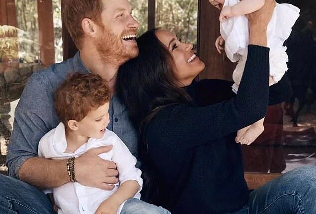 During a walkabout on a joint engagement with Meghan when she was six months pregnant with Archie, in January 2019, Harry (pictured with his wife and their children) seemingly discussed name choices for their firstborn