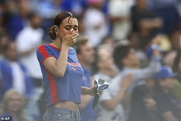 Singer Nezza performed the national anthem in Spanish at the Dodgers game on Saturday