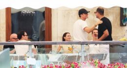 A 'newly single' Orlando Bloom enjoyed a boys' lunch with pals Tom Brady and Scooter Braun, (second from left) at hotel Gritti Palace on Thursday afternoon