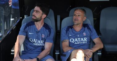 Luis Enrique (right) says players are suffering at the Club World Cup due to the searing heat