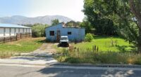 A 45-year-old man said to be wearing a bomb vest in Hyrum, Utah is in a standoff with police after he allegedly said he murdered his wife Sunday morning