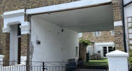 Nicholas Patrick-Hilley was shocked when he arrived to find his bell-ringer neighbour, Adrian Udal, 65, demolishing the door and roller gate of his new home in an act of 'wanton destruction'
