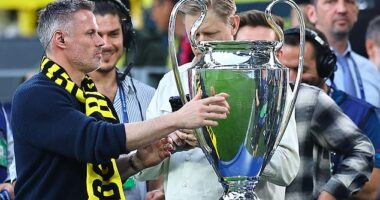 Jamie Carragher wore a Borussia Dortmund scarf during their victory over PSG last season