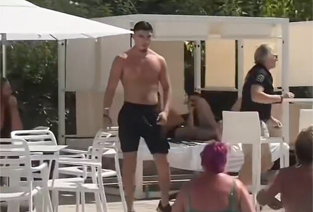 Oldham striker Kian Harratt was filmed launching a chair in the direction of a woman at an Ibiza resort